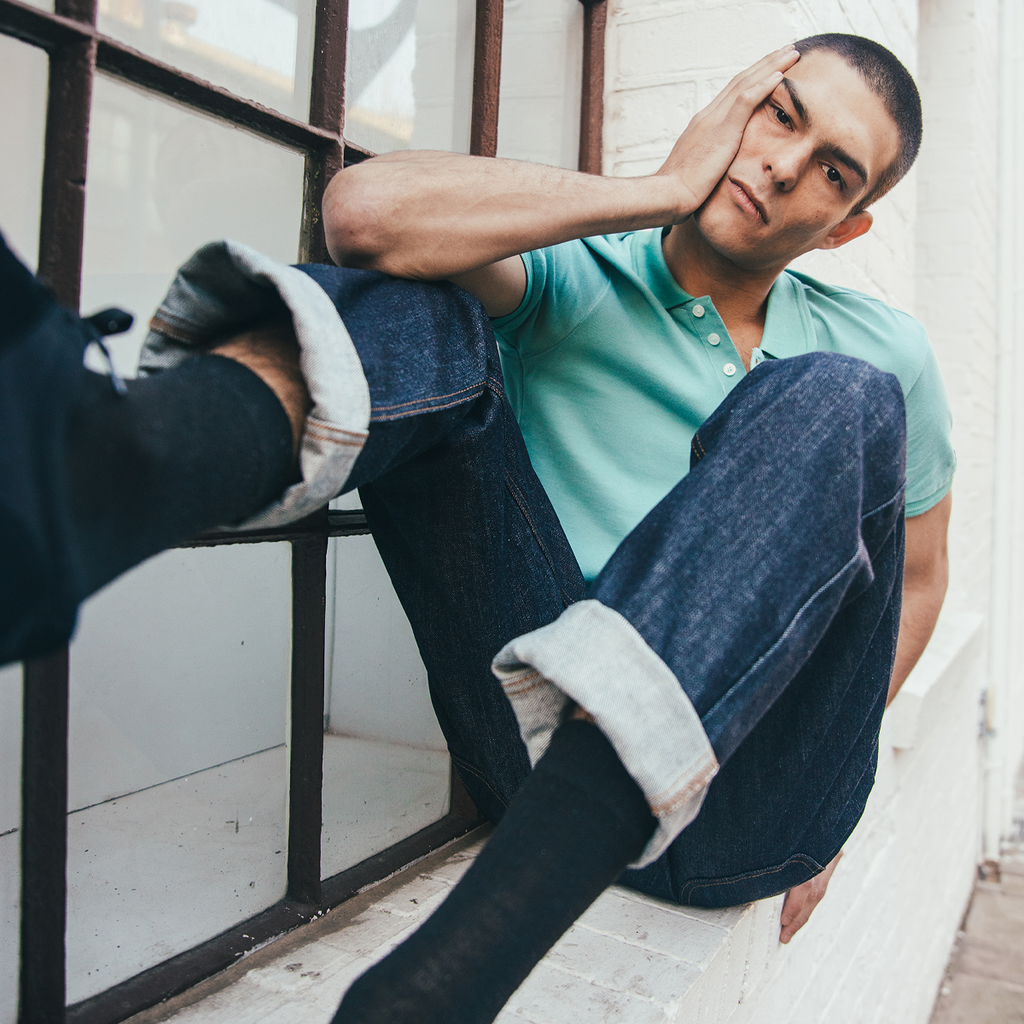 Guy posing in a Lee Brokklyn Indigo Stretch Mens Denim Jeans